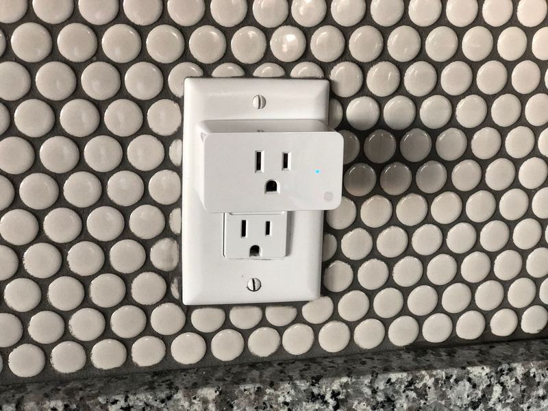 Duplex outlet on a tiled kitchen backsplash